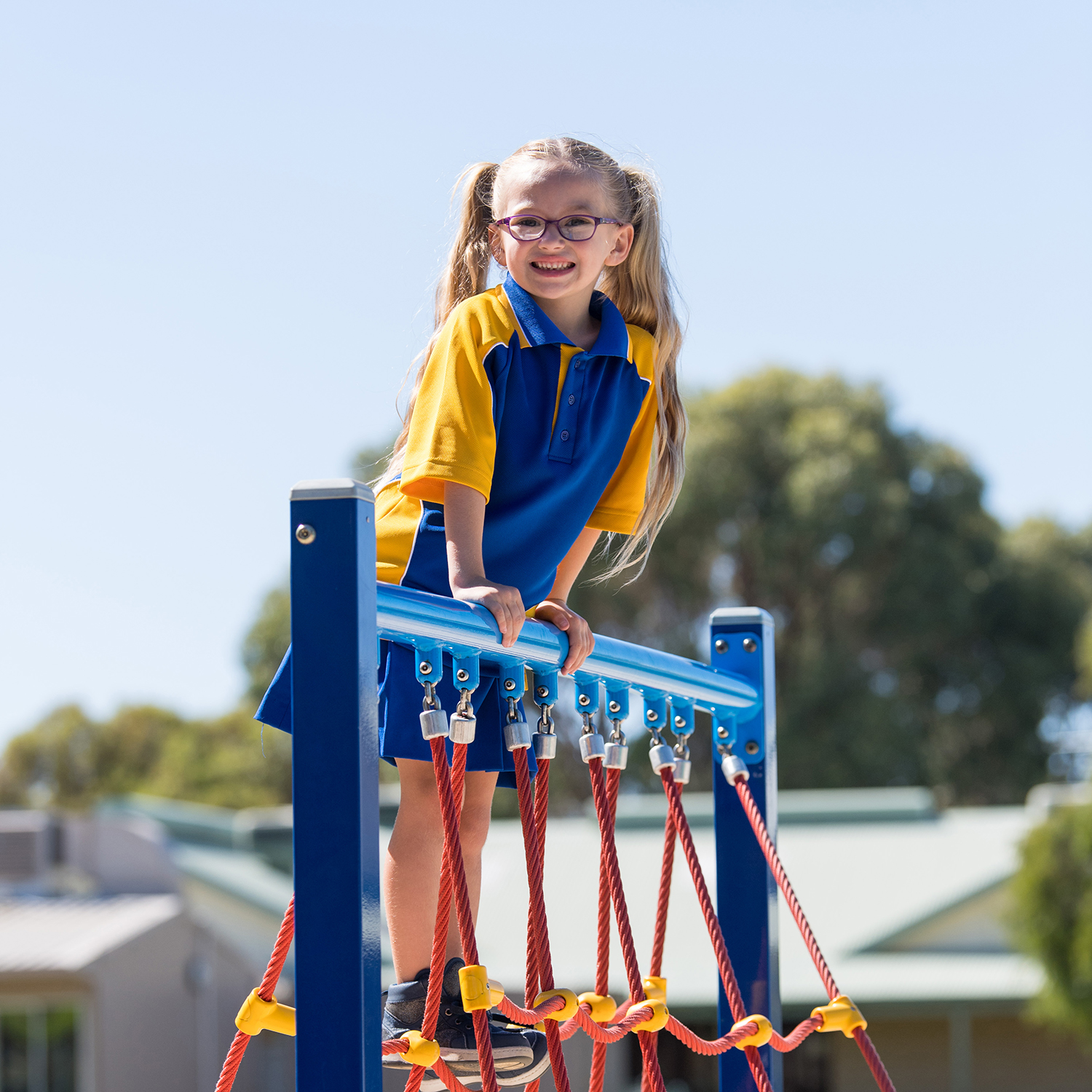 Student in JFE uniform on playground